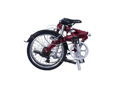 Folded metallic red Route aluminum bicycle with black saddle and silver crankset on white background.